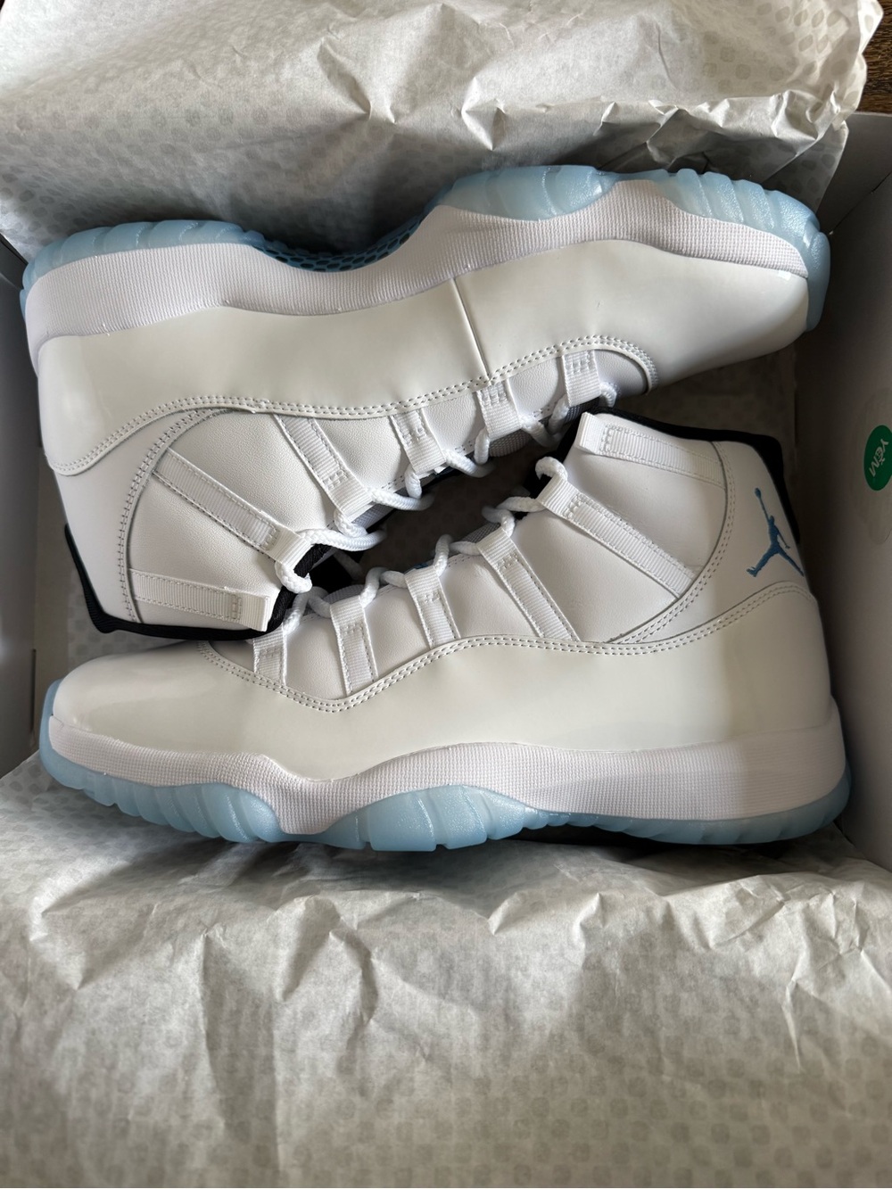 Jordan Mens Retro 11 High-Top Sneakers in White/Light Blue